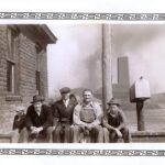 ~1950 sitting on a low brick wall next to the plant office (since gone).  From left: child, Erridine Gray, Francis Trueblood, Ralph Gray, and unknown man.
